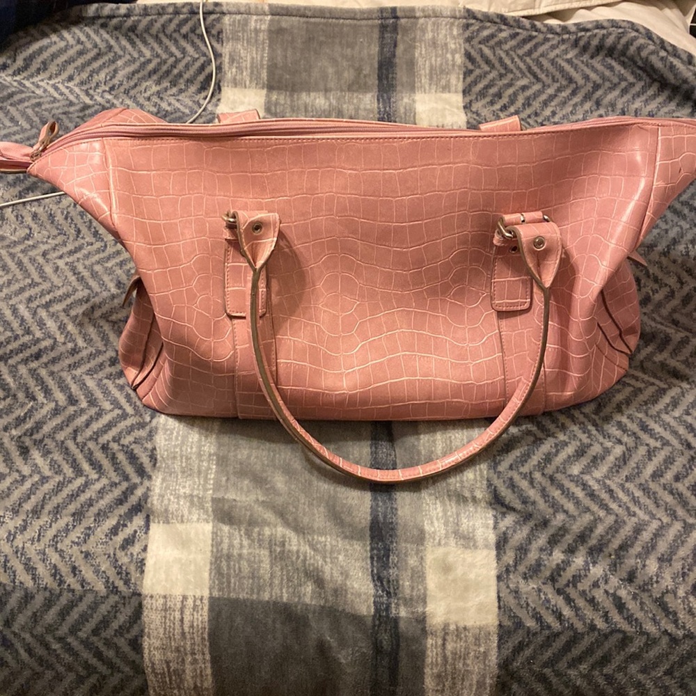 Beautiful pink bueno duffel bag